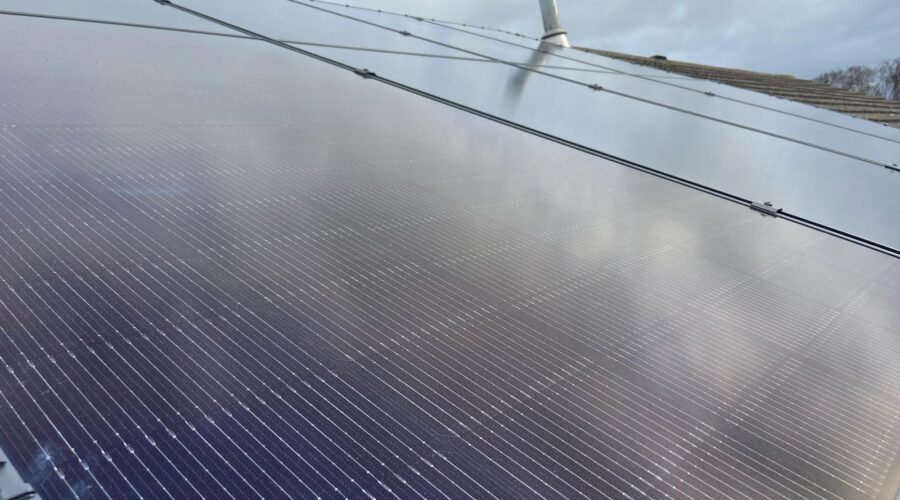 A close up picture of an array of solar panels installed on a house in Birchwood, Lincoln.
